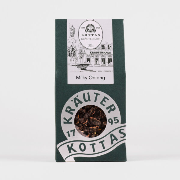 Dunkelgrüne Verpackung mit KOTTAS Kräuterhaus Milky Oolong Tee