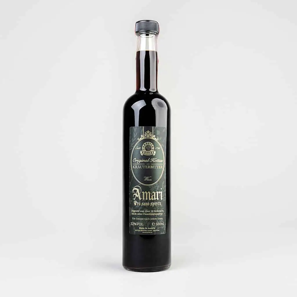 A bottle of DR. KOTTAS Amari herbal bitters in a vintage look.