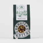 Dunkelgrüne Verpackung mit KOTTAS Kräuterhaus Meditationstee