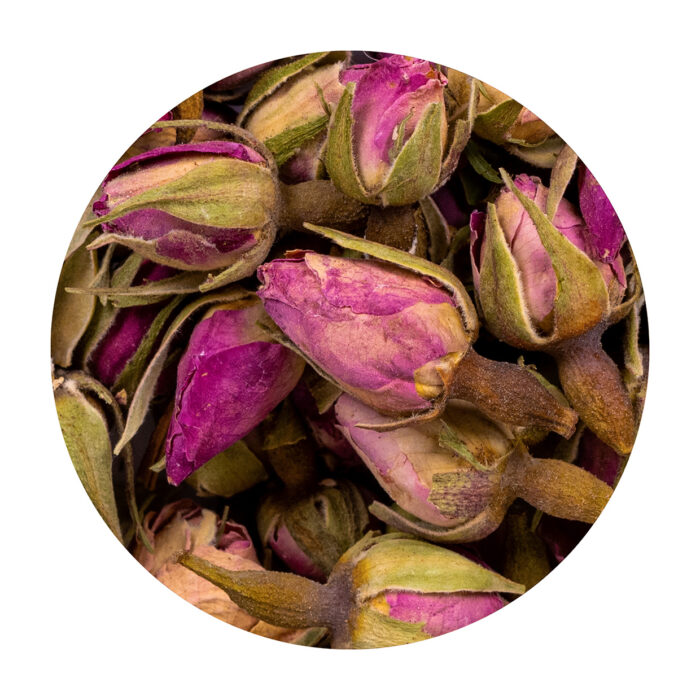 A close-up of dried rosebuds. The flowers are bright pink and beautiful.