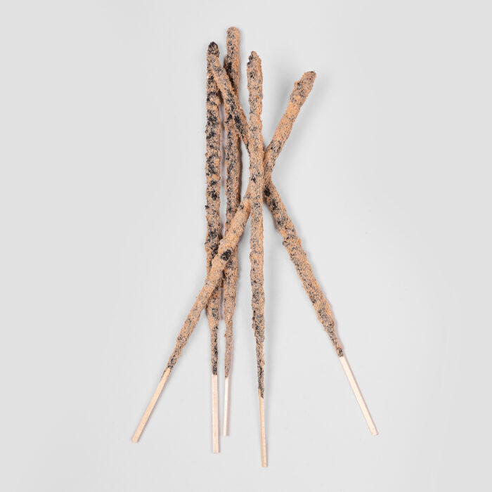 Sagrada Madre incense sticks with sandalwood and frankincense. They are handmade and of a light colour.