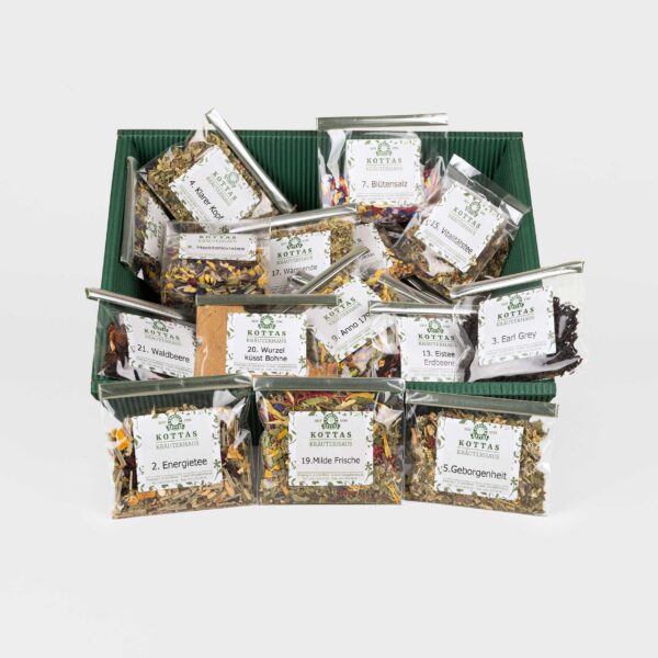 KOTTAS Kräuterhaus Adventkalender Kennenlernset in dunkelgrüner Karton-Verpackung mit losen Tees und Gewürzen