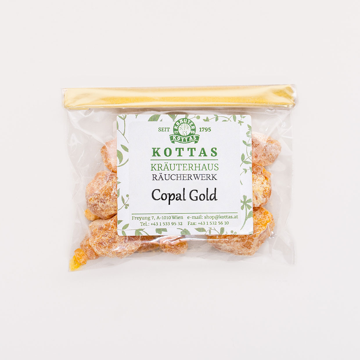 Copal-Gold Cellophanbeutel mit KOTTAS Kräuterhaus Copal Gold, gefüllt mit goldgelben Harzstücken zum Räuchern.