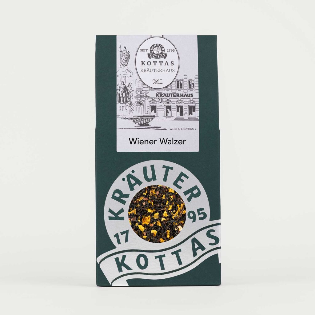 Grüne Packung KOTTAS Kräuterhaus Wiener Walzer Schwarzteemischung mit Sanddornbeeren und alkoholfreiem Rum-Aroma