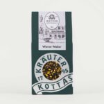 Grüne Packung KOTTAS Kräuterhaus Wiener Walzer Schwarzteemischung mit Sanddornbeeren und alkoholfreiem Rum-Aroma