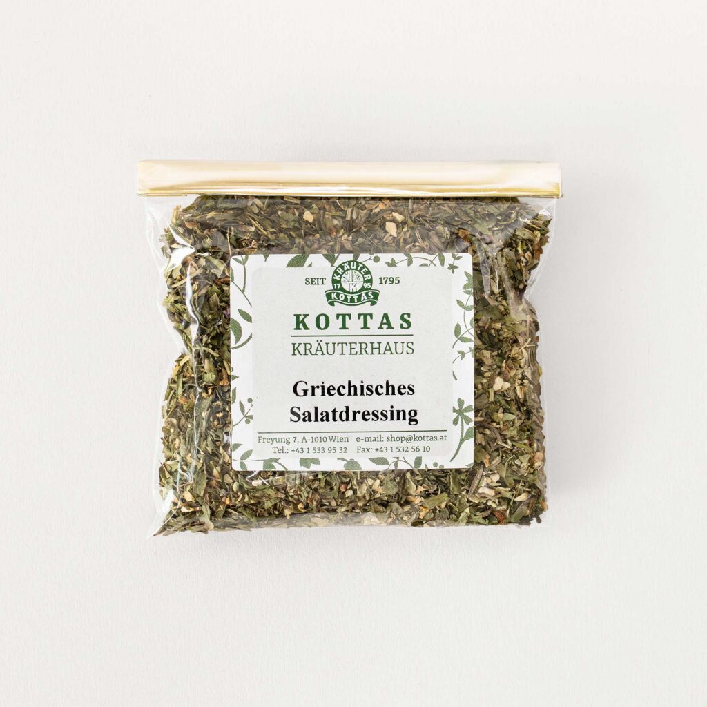 Transparente Packung mit KOTTAS Kräuterhaus Griechisches Salatdressing.